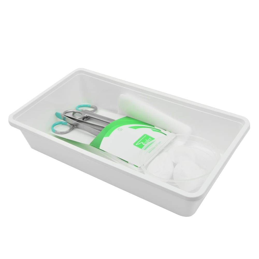 Sterile wound care pack in plastic tray with scissors, forceps, gauze swabs and disposable instruments
