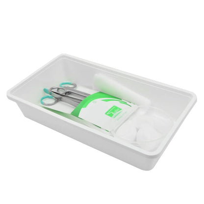Sterile wound care pack in plastic tray with scissors, forceps, gauze swabs and disposable instruments